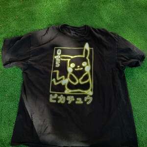 Pokemon Pikachu #025 Neon Japanese Logo Graphic Black T-Shirt